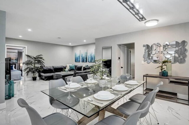 dining space with light tile patterned flooring