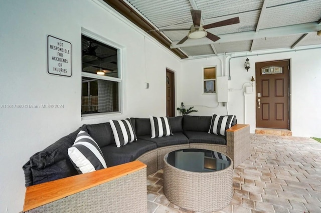 view of patio / terrace with an outdoor living space and ceiling fan