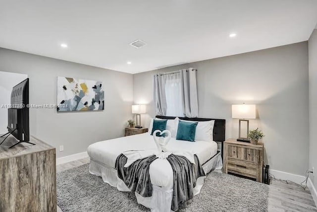 bedroom featuring light hardwood / wood-style flooring