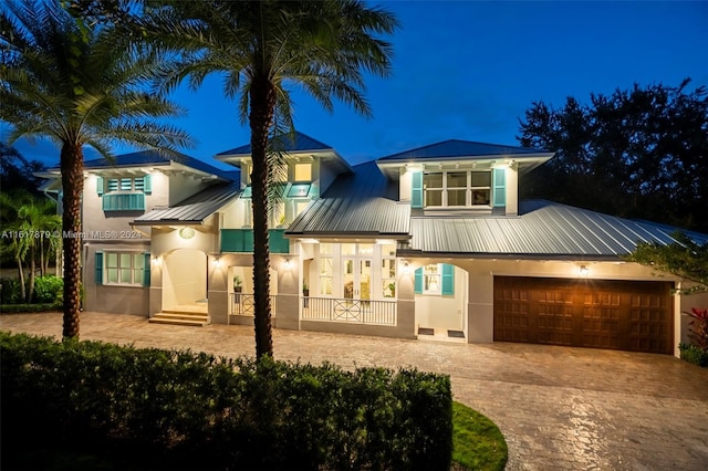 view of front of home with a garage