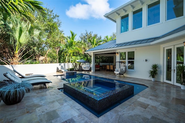 view of pool with a patio area and an outdoor hangout area