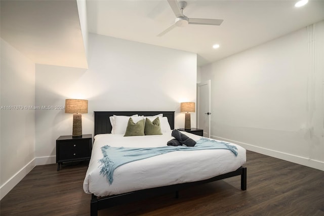 bedroom featuring dark hardwood / wood-style flooring and ceiling fan