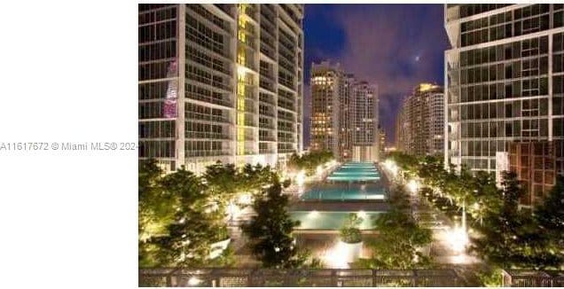 465 Brickell Ave Unit 3706, Miami, FL 33131 - property at twilight featuring a view of city lights
