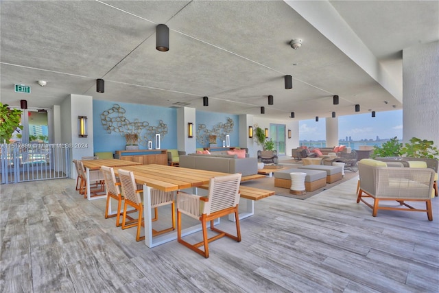 dining space with light hardwood / wood-style floors