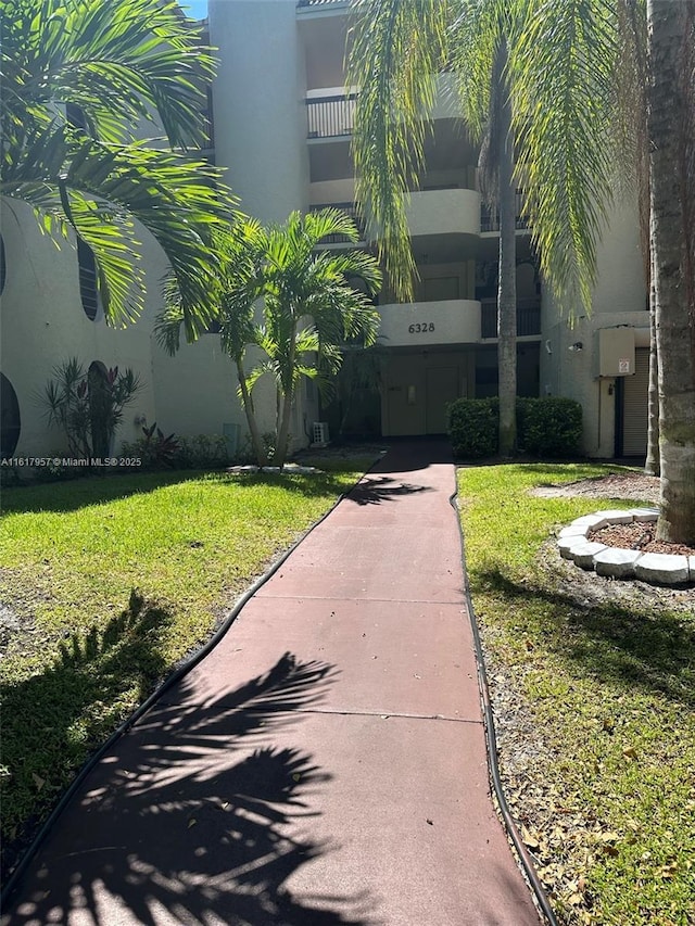 6328 W Longboat Ln W Unit 201, Boca Raton, FL 33433 - view of home's community with a yard