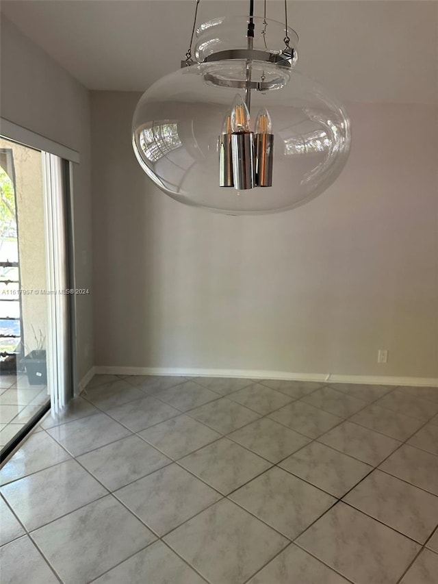 empty room featuring light tile patterned floors