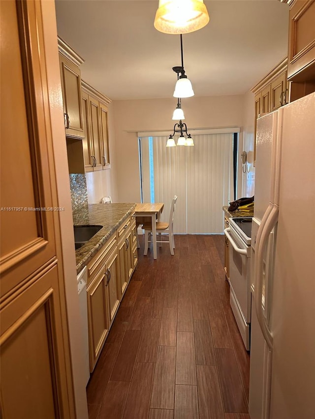 kitchen featuring dark stone countertops, white appliances, backsplash, dark hardwood / wood-style floors, and pendant lighting