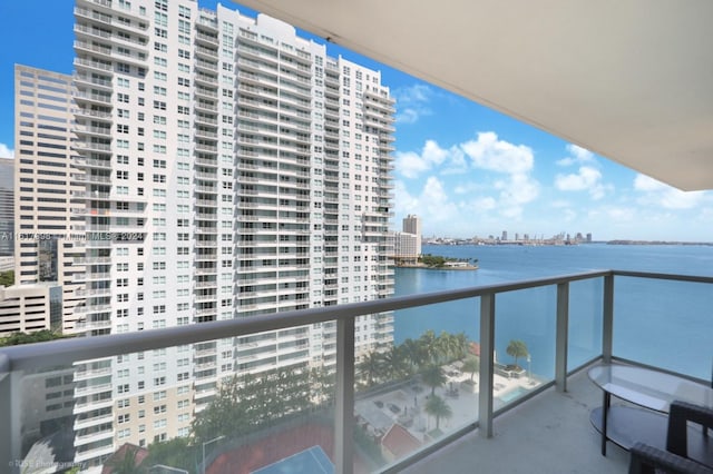 balcony featuring a water view