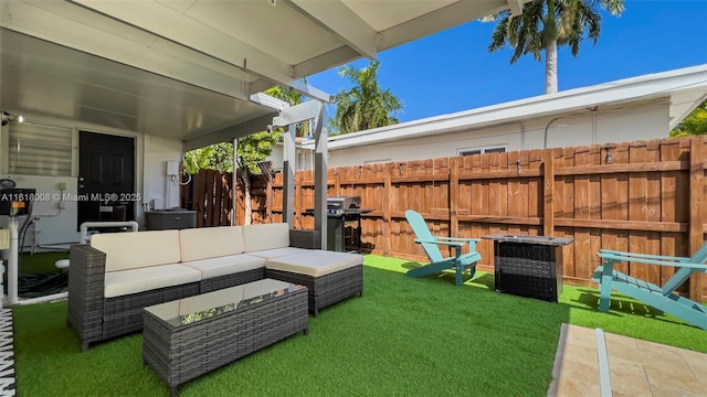 view of patio / terrace featuring an outdoor living space and a grill