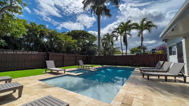 view of swimming pool featuring an in ground hot tub and a patio area