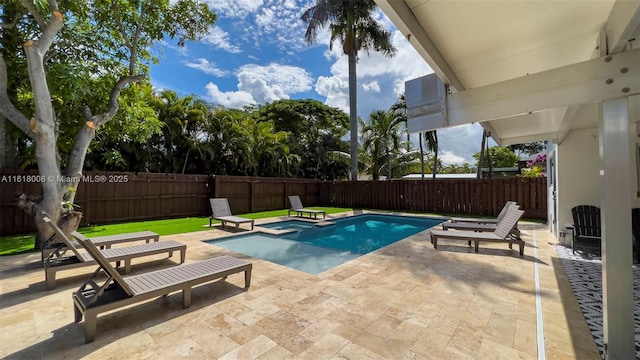 view of swimming pool featuring a patio area