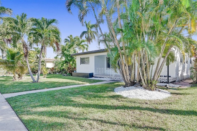 view of front of home with a front yard