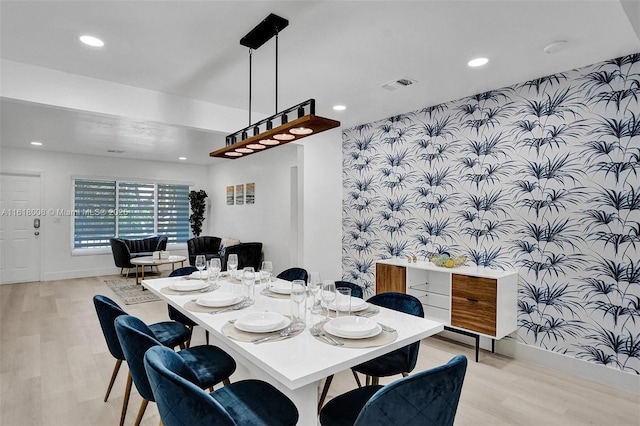 dining room featuring light wood-type flooring