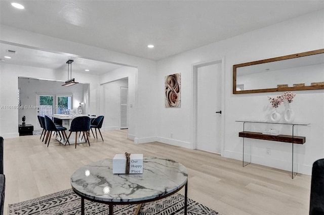 living room featuring light hardwood / wood-style flooring