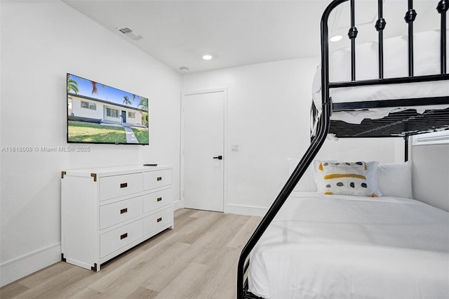 bedroom featuring light hardwood / wood-style flooring