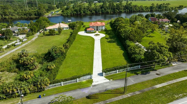 birds eye view of property featuring a water view