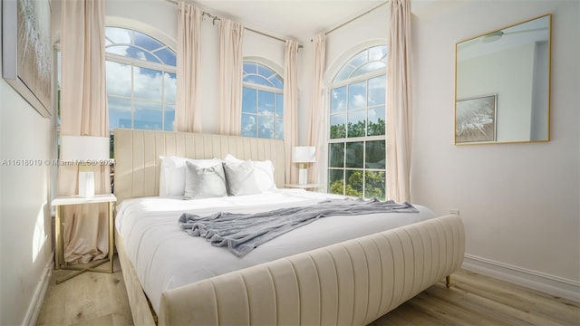 bedroom with light wood-type flooring