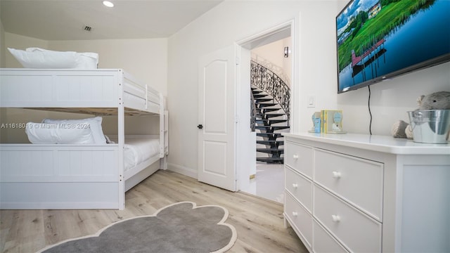 bedroom featuring light hardwood / wood-style flooring