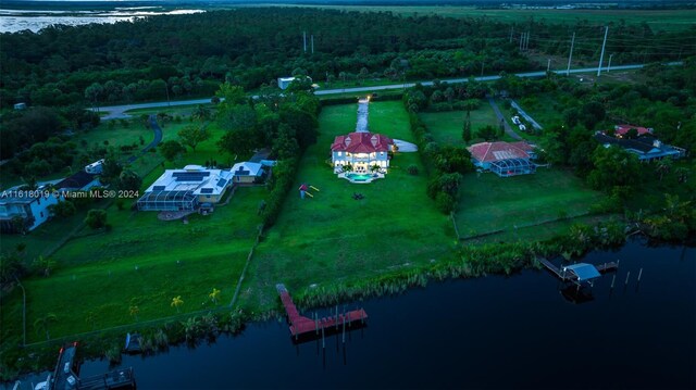 drone / aerial view featuring a water view