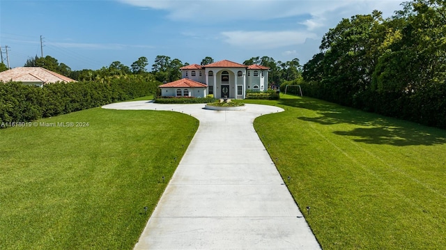 view of front of home with a front yard