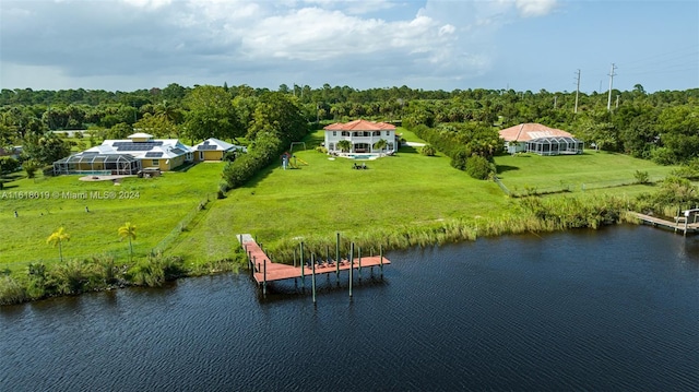 drone / aerial view with a water view