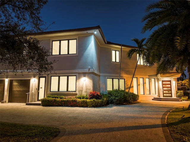 view of front of house with a garage