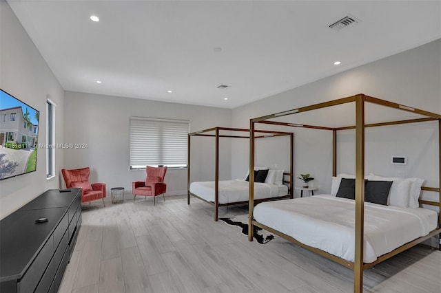 bedroom featuring light hardwood / wood-style flooring