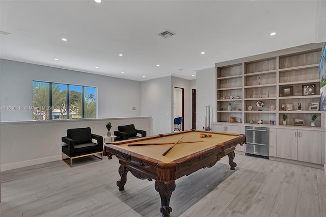 playroom with pool table and light hardwood / wood-style floors