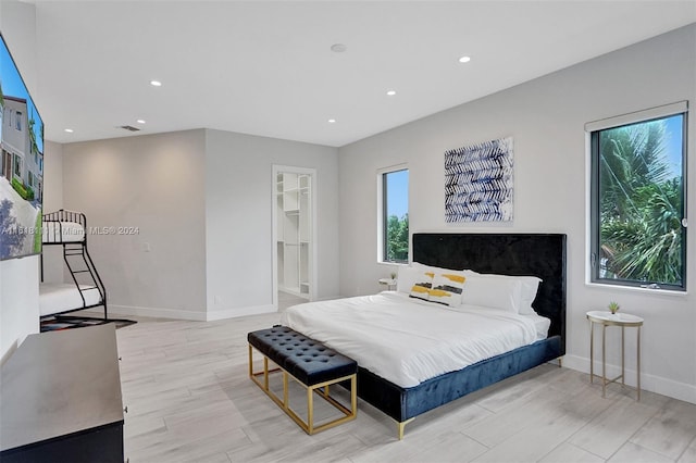 bedroom with light hardwood / wood-style floors