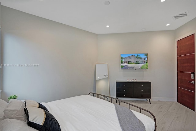 bedroom featuring light wood-type flooring