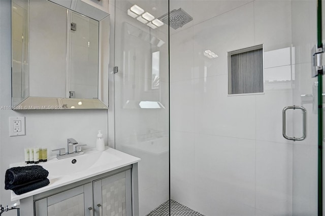 bathroom with sink and walk in shower