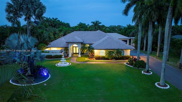 view of front of home featuring a yard