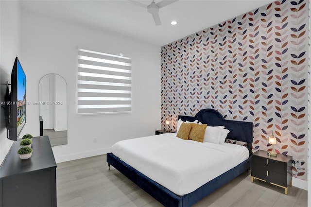 bedroom with wood-type flooring