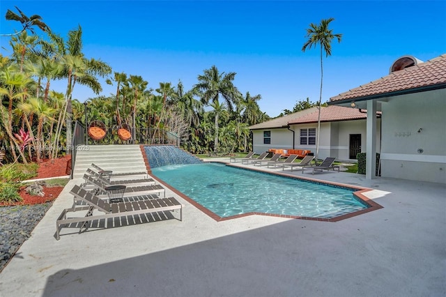 view of pool featuring a patio area