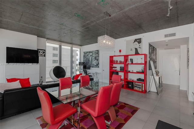 dining space featuring visible vents and light tile patterned flooring