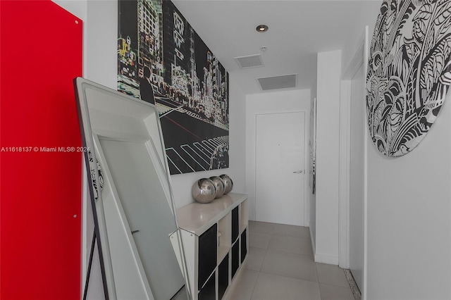 hallway featuring tile patterned floors