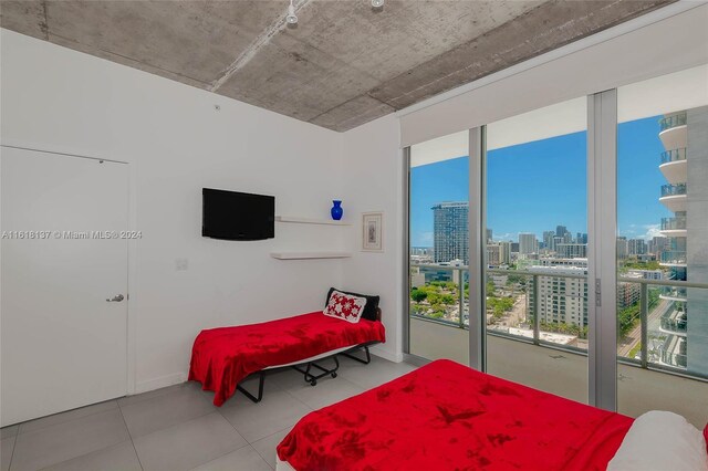 tiled bedroom with access to exterior