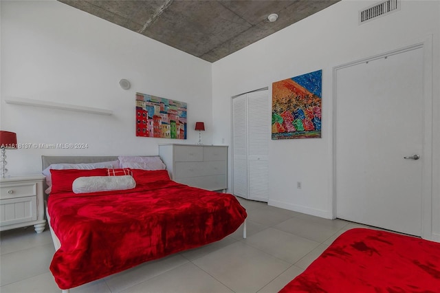 bedroom with tile patterned flooring