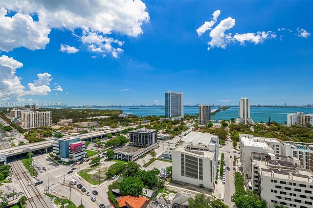 drone / aerial view with a water view