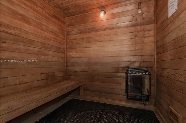 view of sauna / steam room with wooden walls