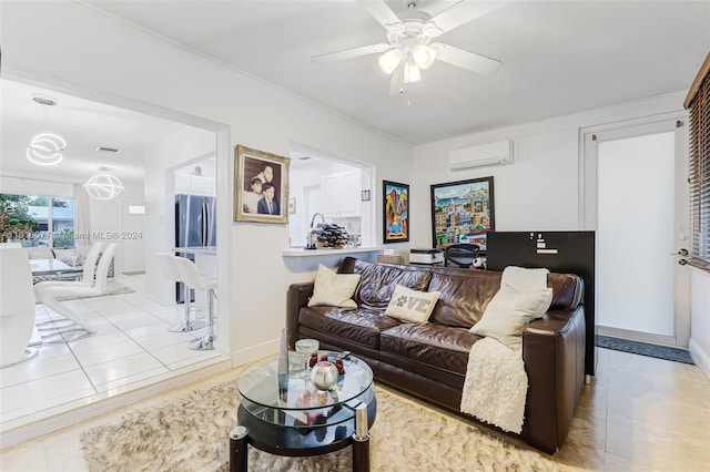 living room with a wall unit AC, ceiling fan, and light tile patterned flooring