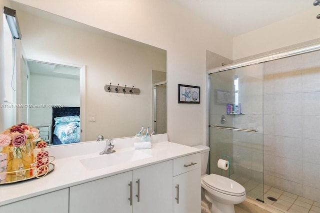 bathroom featuring walk in shower, toilet, and vanity