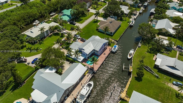 bird's eye view with a water view