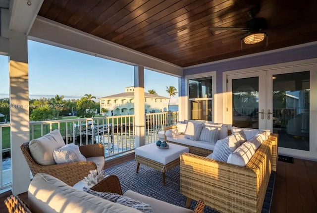 exterior space featuring an outdoor hangout area, french doors, and ceiling fan