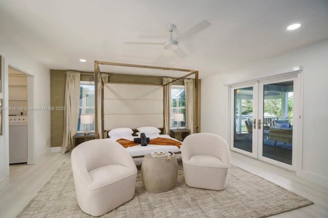 bedroom with french doors, washer / dryer, access to outside, ceiling fan, and light hardwood / wood-style flooring