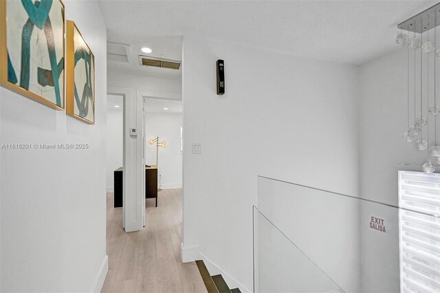 hallway featuring light wood-type flooring