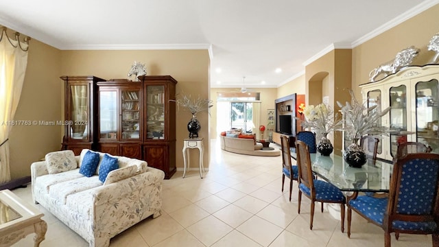 tiled dining area featuring ornamental molding