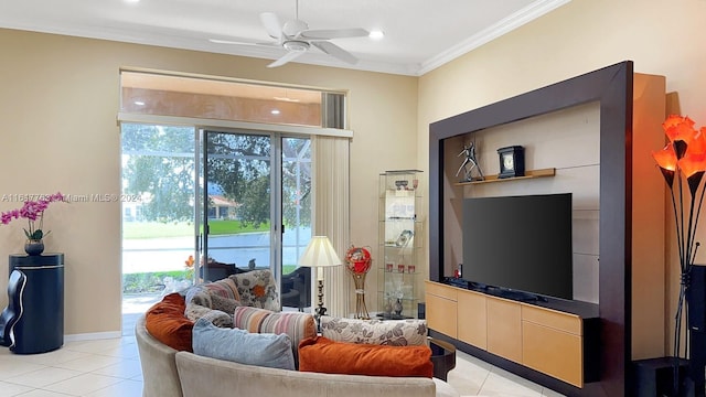 tiled living room with ceiling fan and crown molding