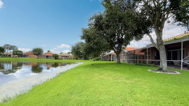 view of yard with a water view