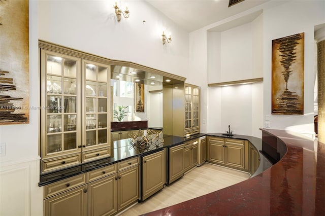 kitchen featuring sink and light wood-type flooring